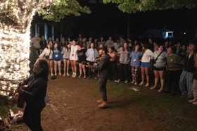 Group of people celebrating on stage