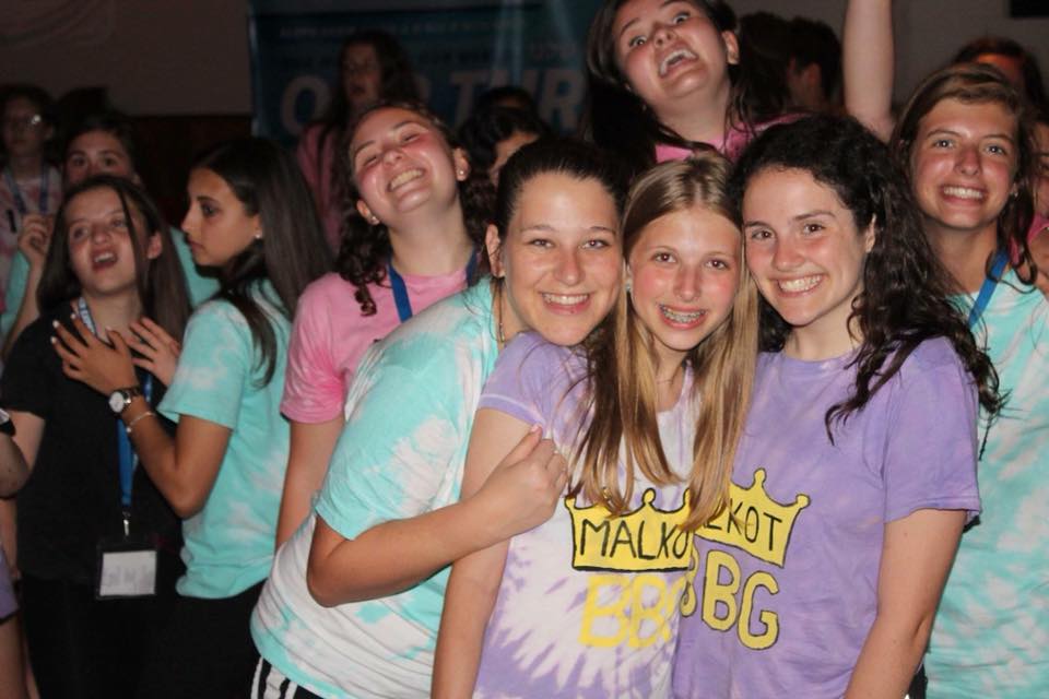 Group of people celebrating on stage