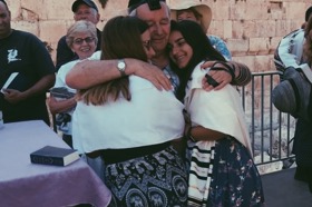 Group of people celebrating on stage