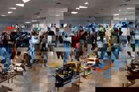 Group of people celebrating on stage