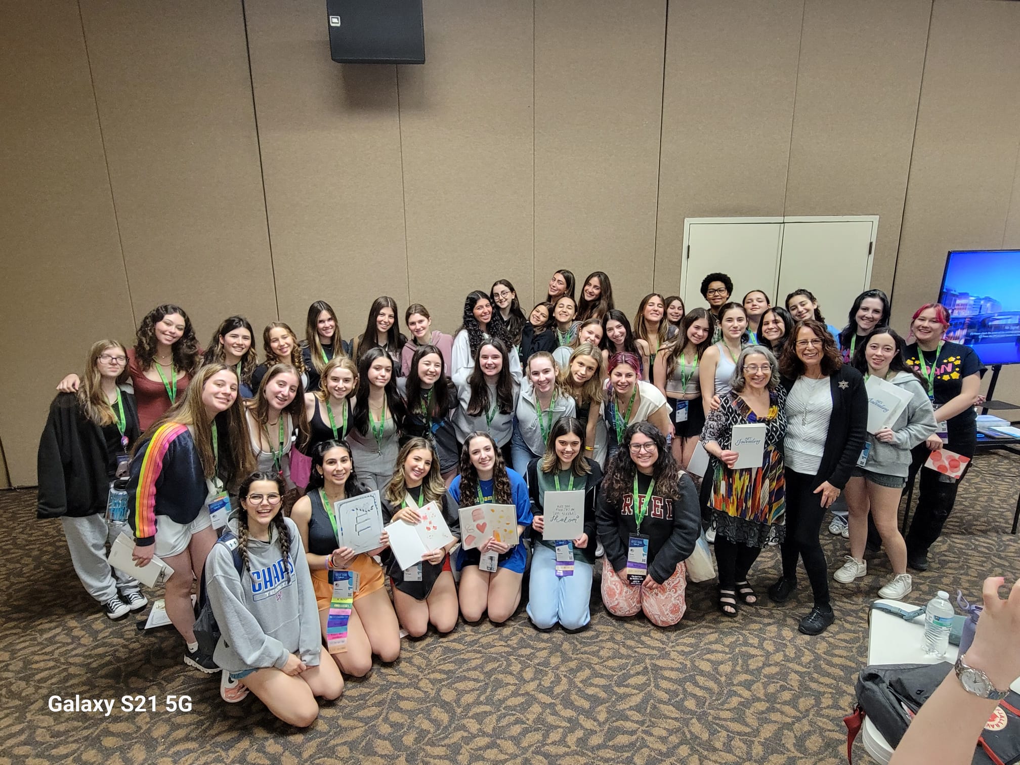 Group of people celebrating on stage