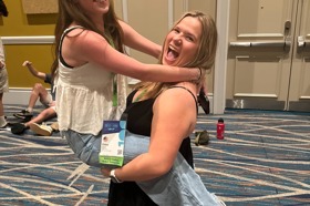 Group of people celebrating on stage