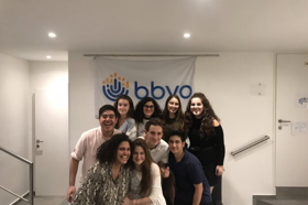 Group of people celebrating on stage