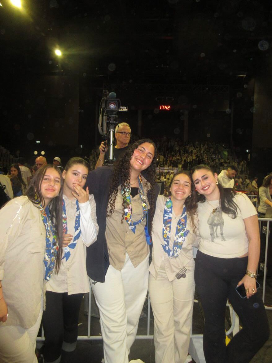 Group of people celebrating on stage