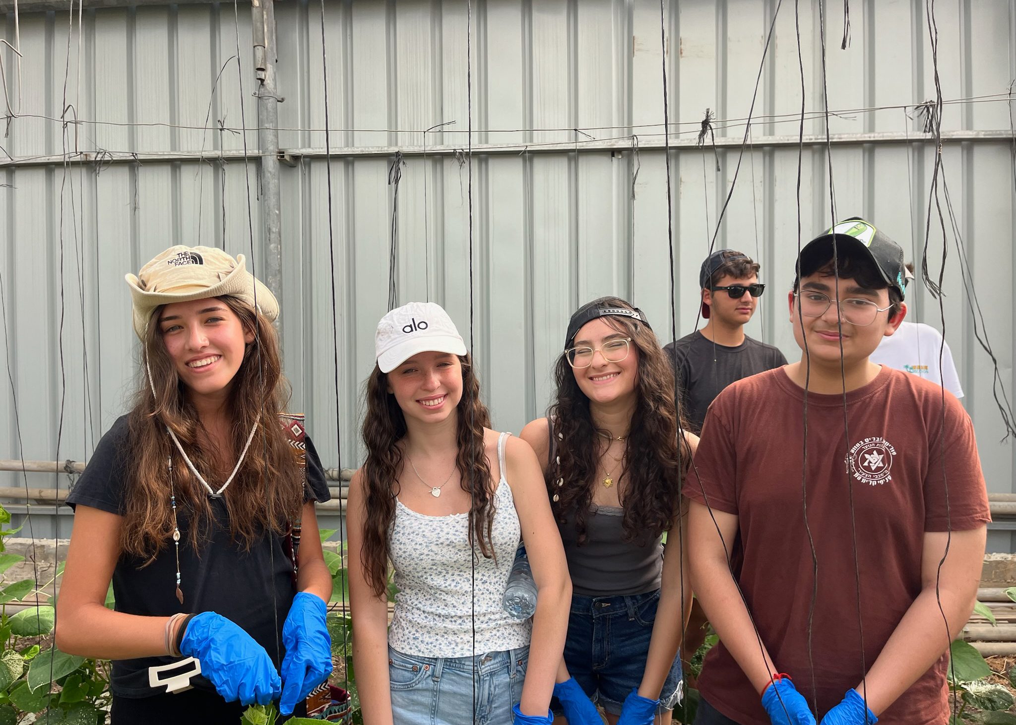 Group of people smiling outdoors