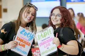 Group of people celebrating on stage
