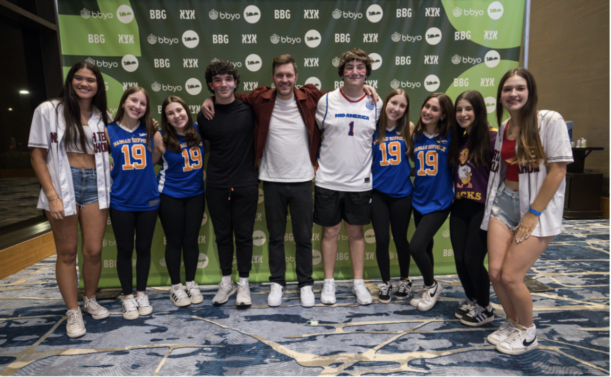 Group of people celebrating on stage