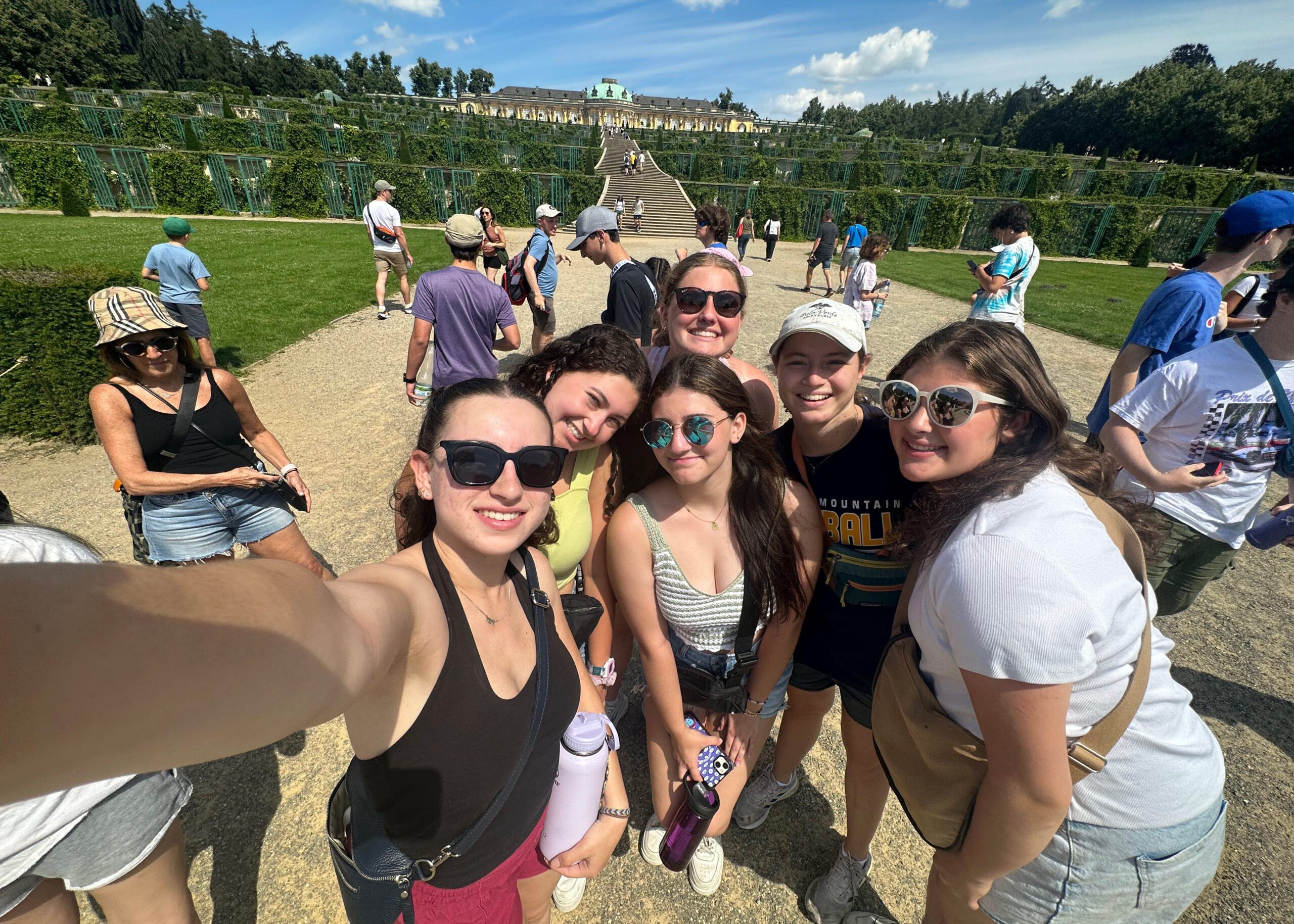 Group of people smiling outdoors