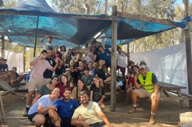 Group of people celebrating on stage