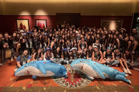 Group of people celebrating on stage