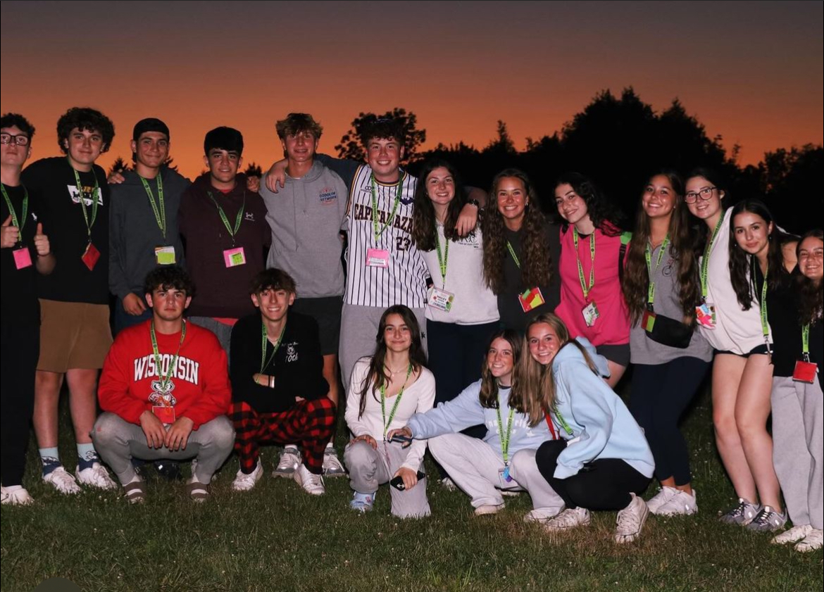 Group of people celebrating on stage