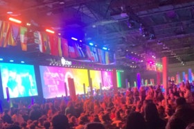 Group of people celebrating on stage