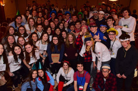 Group of people celebrating on stage