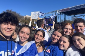 Group of people celebrating on stage