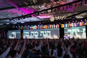 Group of people celebrating on stage