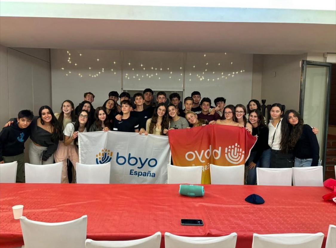 Group of people celebrating on stage