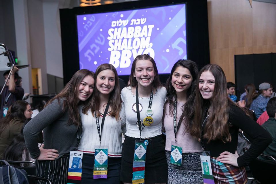 Group of people celebrating on stage