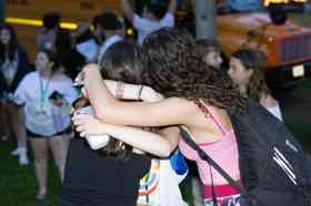 Group of people celebrating on stage