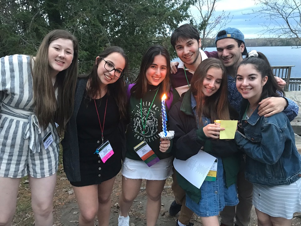 Group of people celebrating on stage