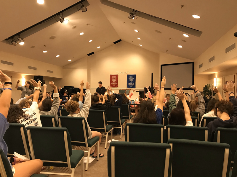Group of people celebrating on stage