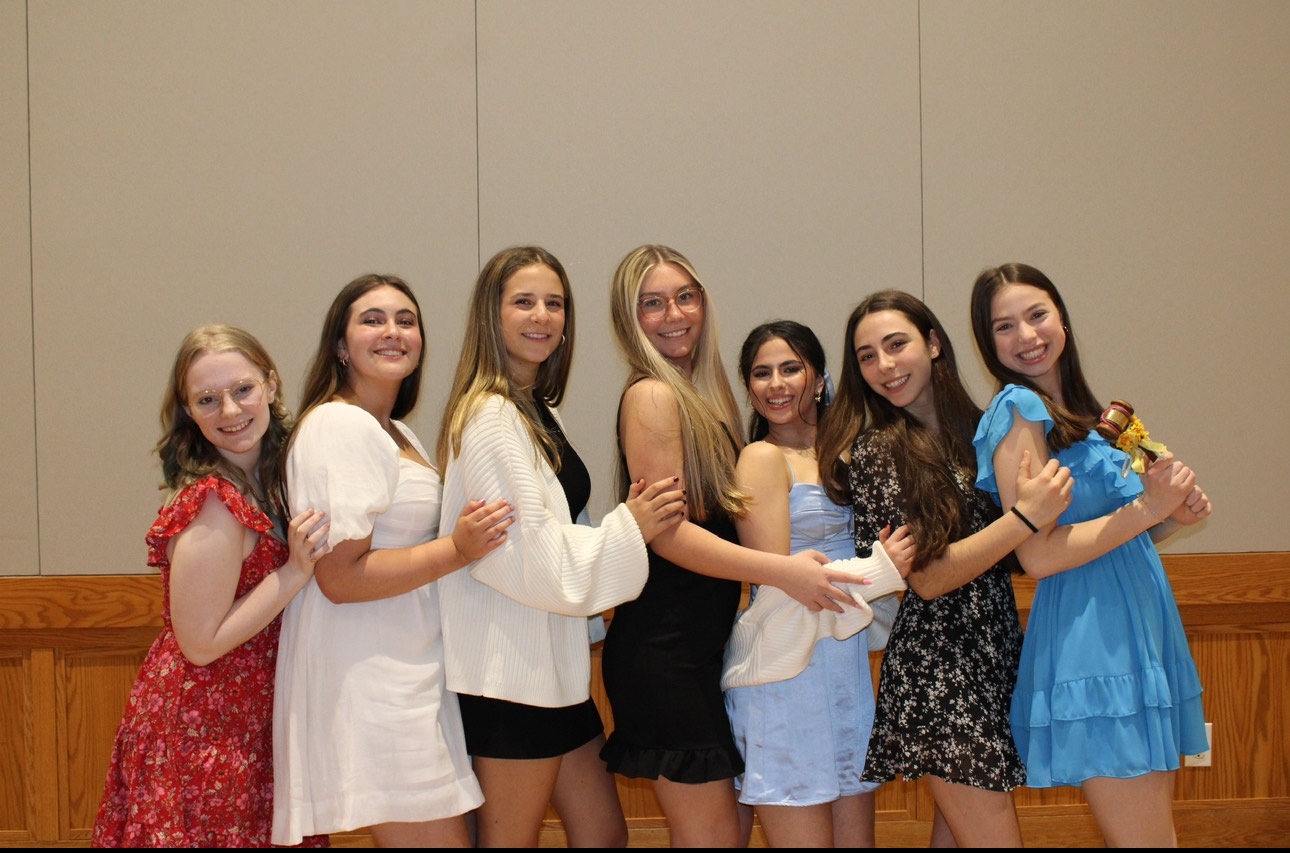 Group of people celebrating on stage