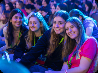 Students enjoying a summer program, standing together with name badges