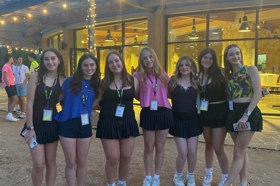 Group of people celebrating on stage