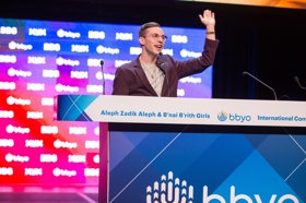 Group of people celebrating on stage