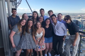 Group of people celebrating on stage