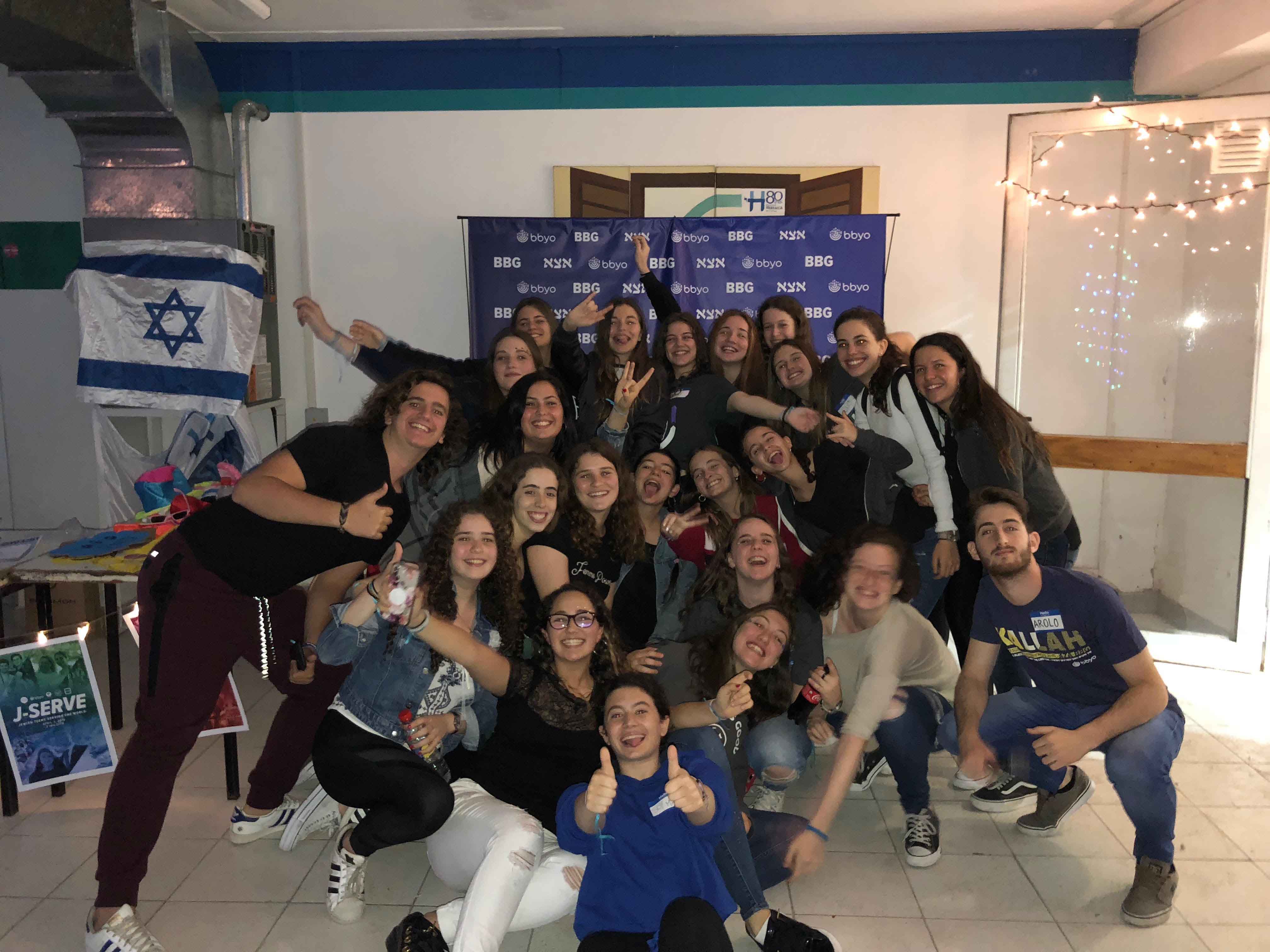 Group of people celebrating on stage