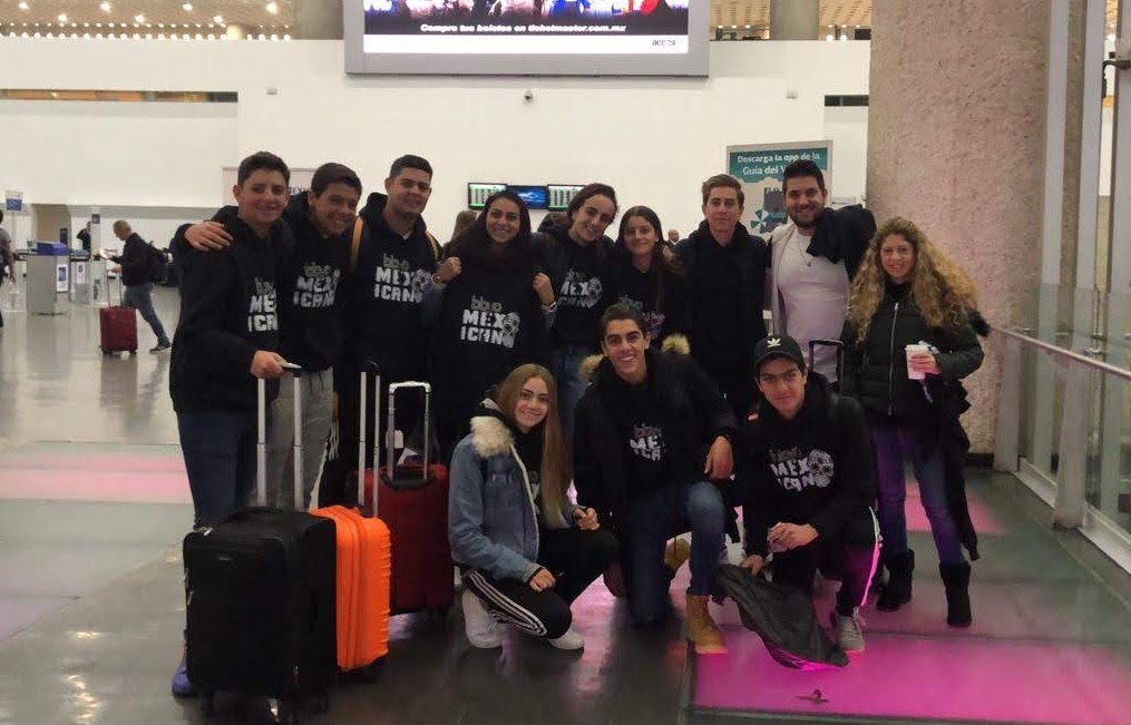 Group of people celebrating on stage