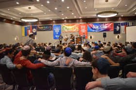 Group of people celebrating on stage