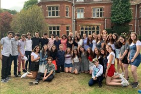Group of people celebrating on stage
