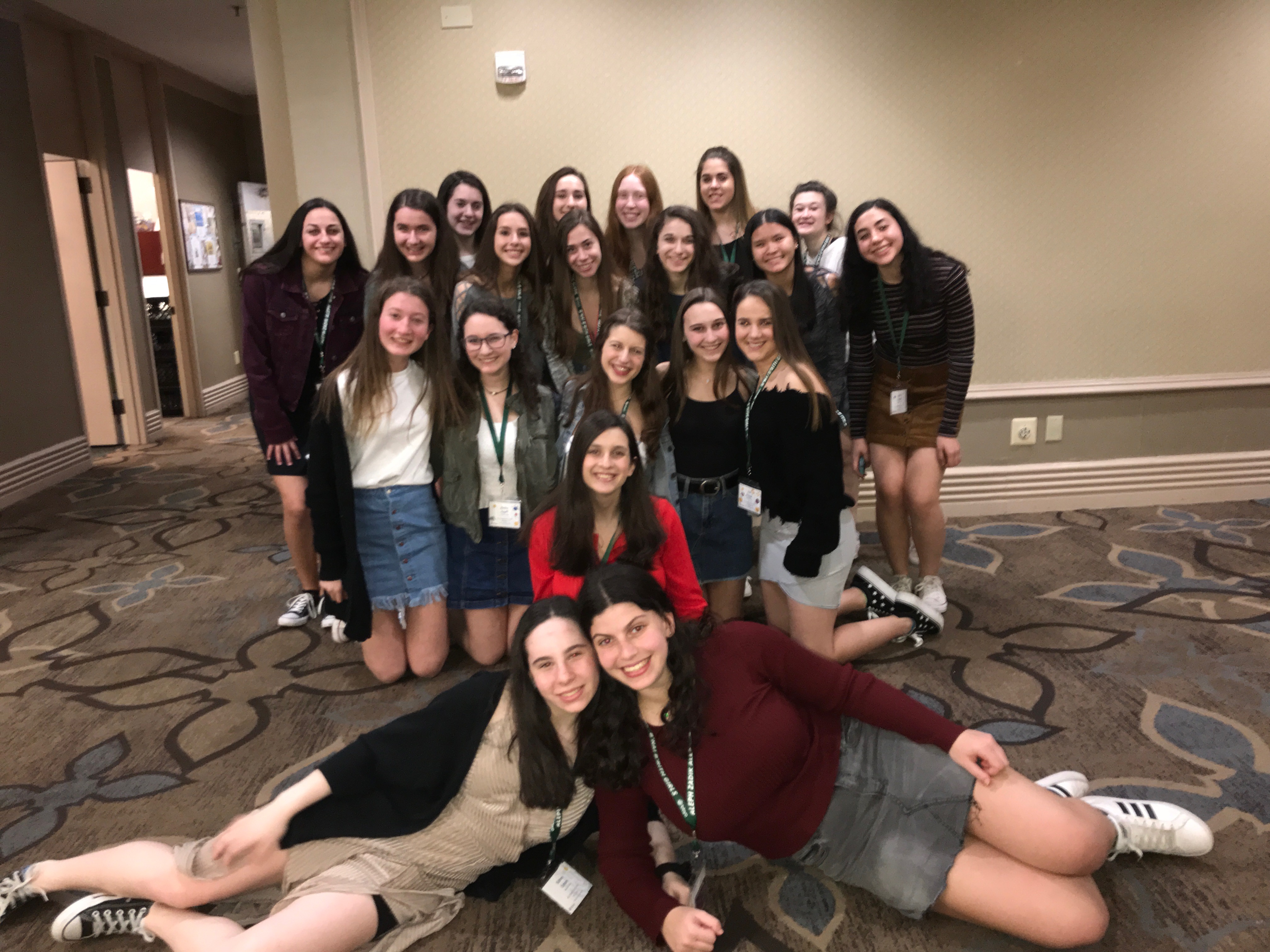 Group of people celebrating on stage