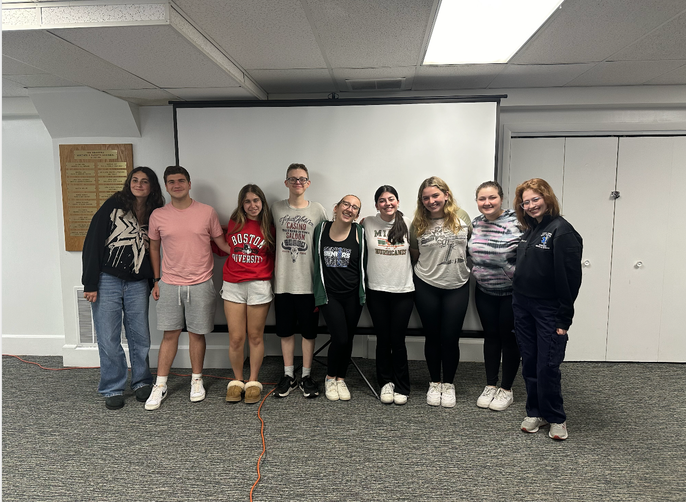 Group of people celebrating on stage