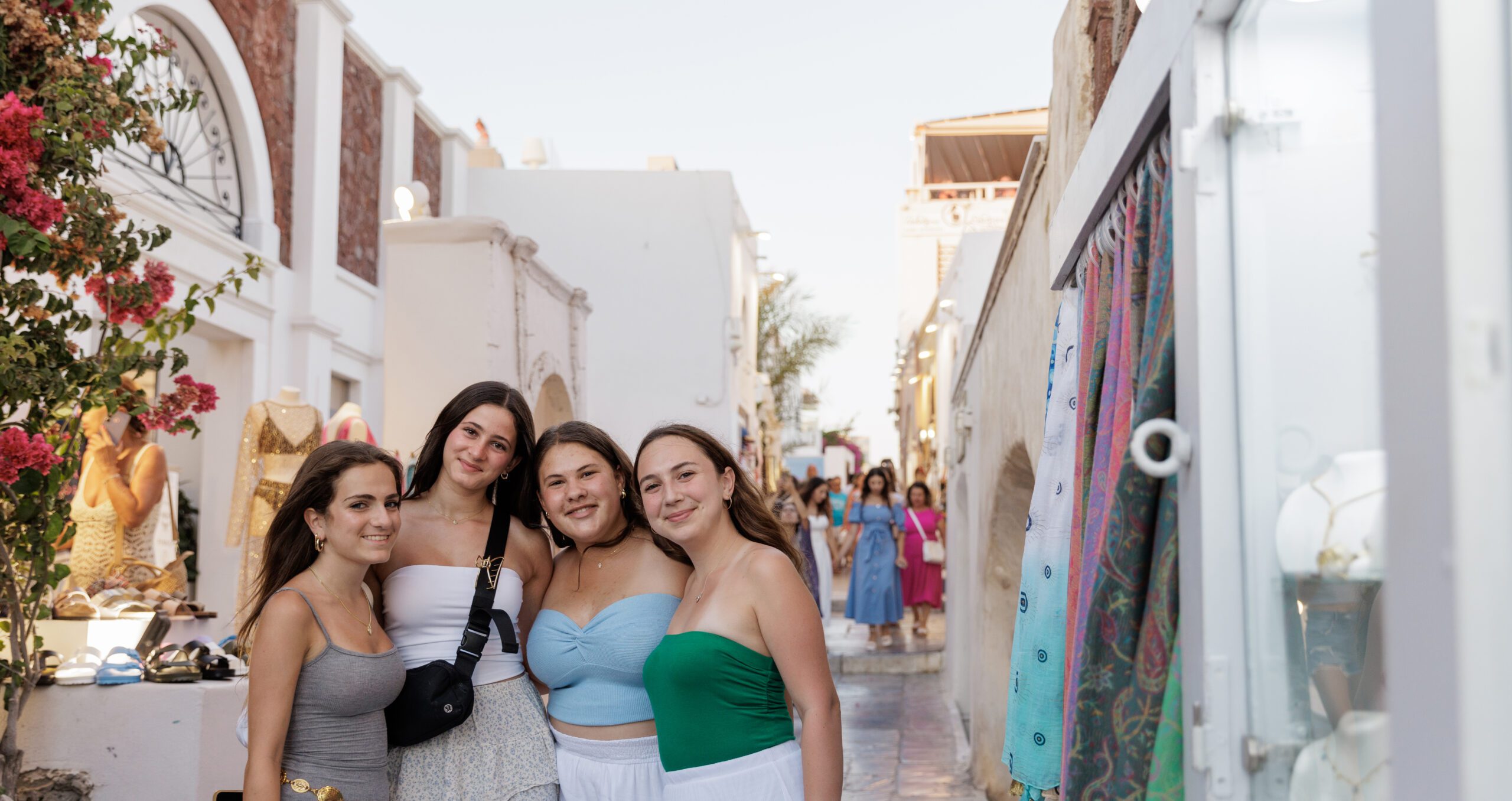 Group of diverse young people smiling at a community event
