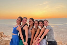 Group of people celebrating on stage