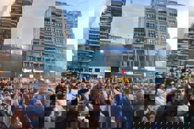 Group of people celebrating on stage