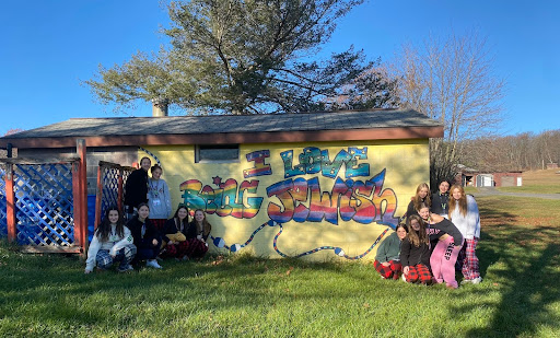 Group of people celebrating on stage
