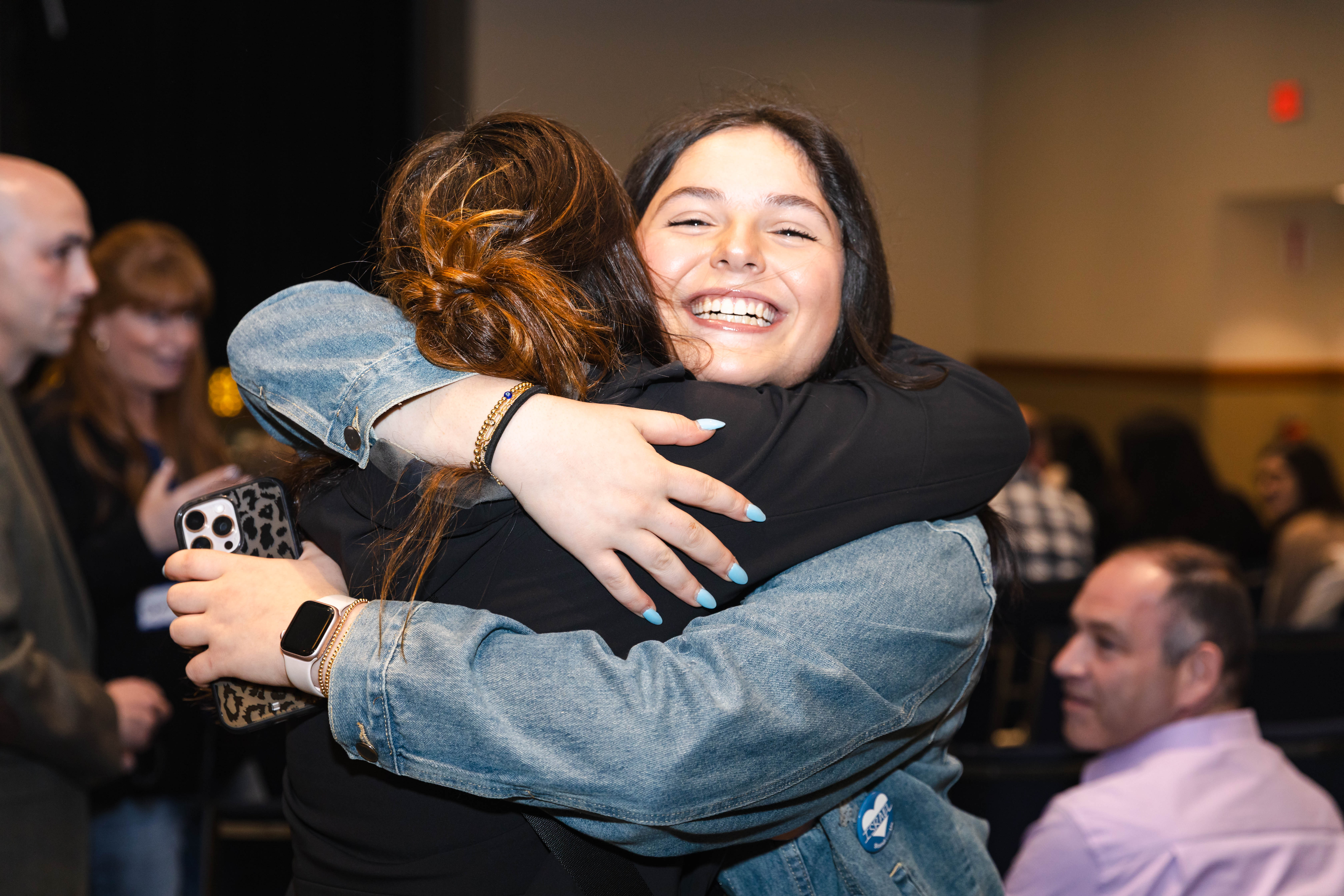 Group of people celebrating on stage