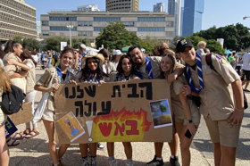 Group of people celebrating on stage