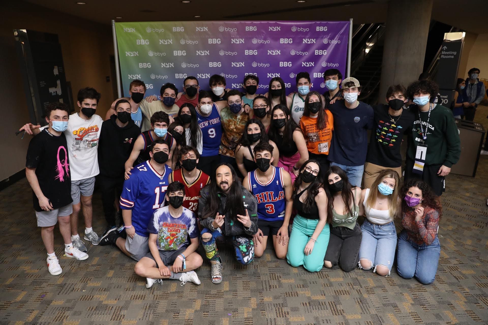 Group of people celebrating on stage