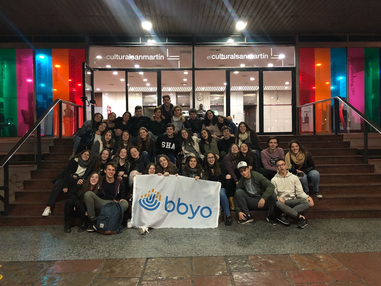 Group of people celebrating on stage