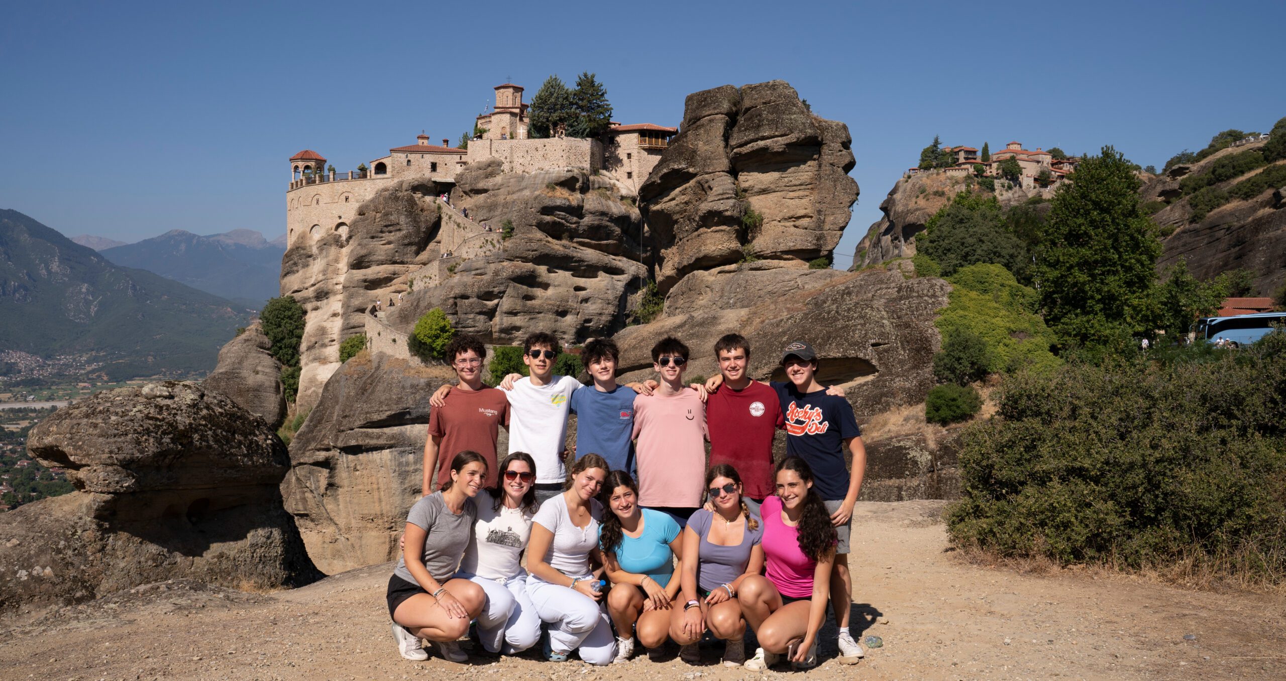 Group of diverse young people smiling at a community event