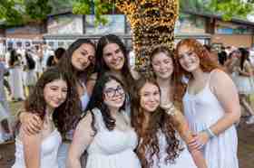 Group of people celebrating on stage