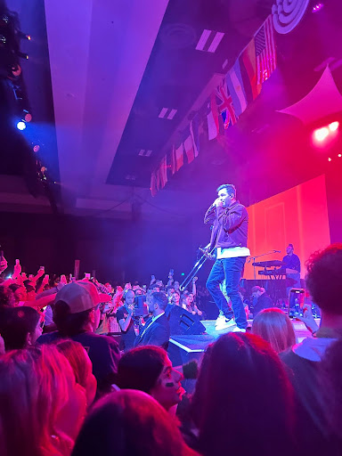 Group of people celebrating on stage