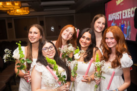 Group of people celebrating on stage