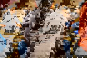 Group of people celebrating on stage