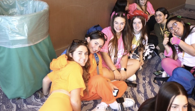 Group of people celebrating on stage