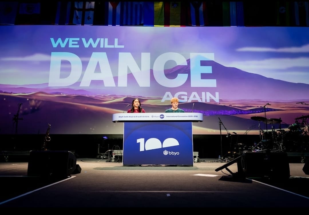 Group of people celebrating on stage